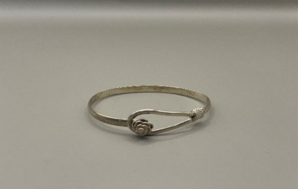 Unknown silver bangle with floral detail
