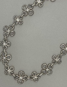 Silver necklace with floral design