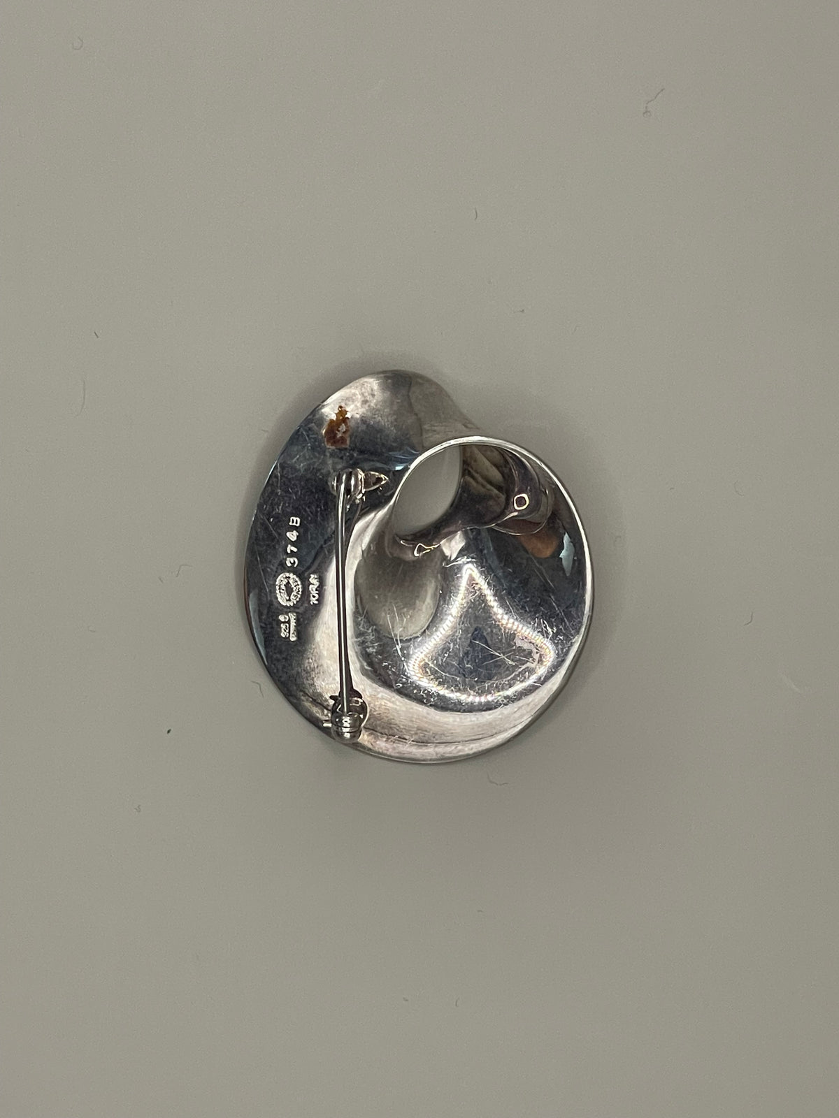 Georg Jensen Möbius brooch – designed by Vivianna Torun Bülow-Hübe