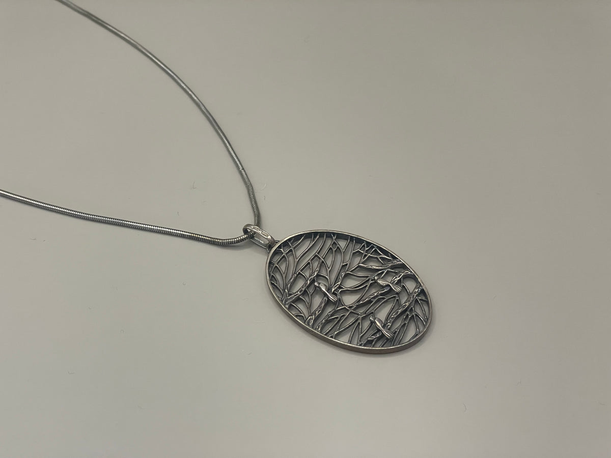Piet Hein pendant with silver chain